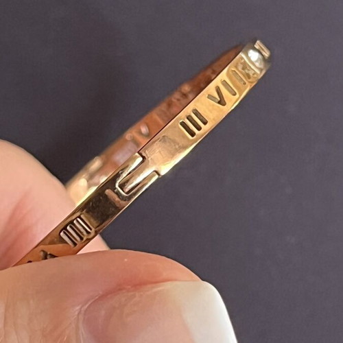 Bracelet used gold-tone stainless steel with Roman numerals and zircon