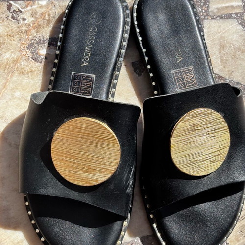 Women's flat sandals used, black with gold buckle, size 38