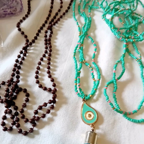 Long necklace like new with turquoise beads and eye-shaped pendant
