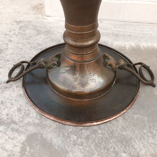Old copper brazier used with brass handles and decorative bird