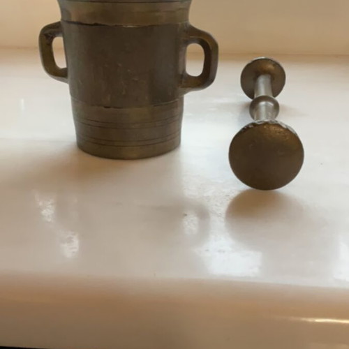 Copper mortar and pestle used, heavy and large