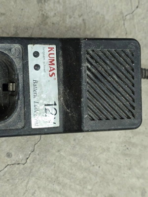 Kumas charger used for repair or spare parts