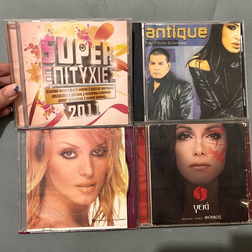 CDs used, pack of 35 with various music genres