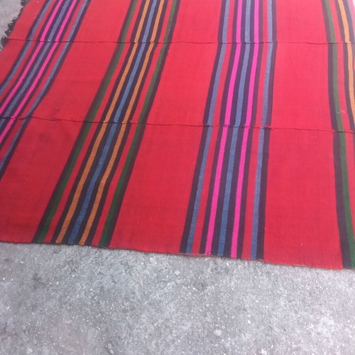 Authentic 100 percent handwoven wool rug used