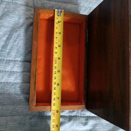 Vintage wooden box used with carved patterns