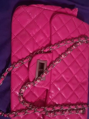 Pink shoulder bag used with damages