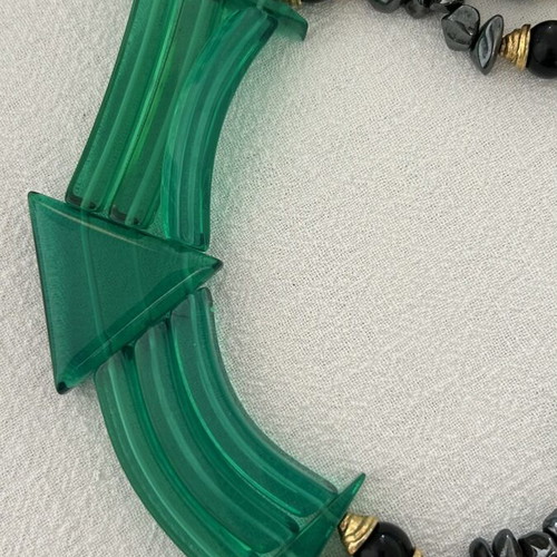 Necklace with three rows of dark gray stones and green finish like new