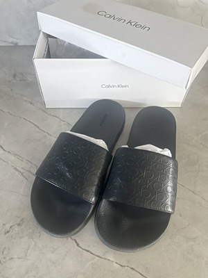 Calvin Klein black slides size 38 like new with box