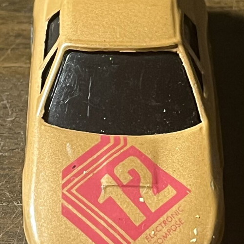 Electronic Compact collectible gold racing car like new