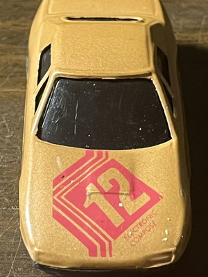 Electronic Compact collectible gold racing car like new