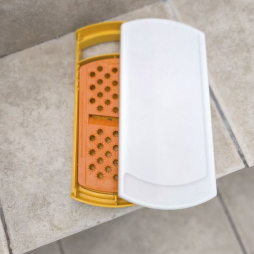 Tupperware grater with multiple cutting options