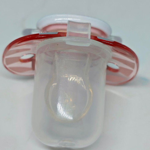 Silicone pacifier with cap and cat design like new, pink