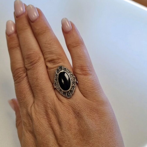 Silver ring with black stone like new, size 57