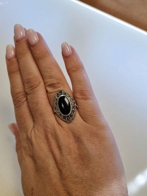 Silver ring with black stone like new, size 57