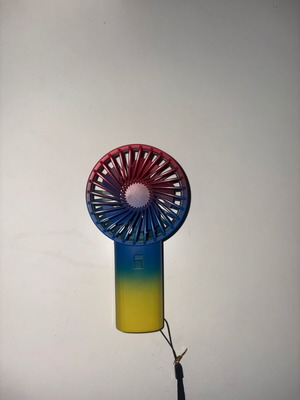 Flying Tiger Copenhagen handheld mini fan rainbow gradient like new
