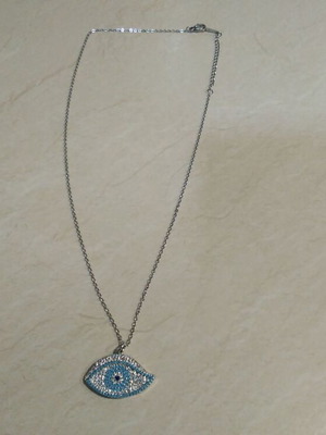 Women's necklace with turquoise and silver lucky eye design, like new