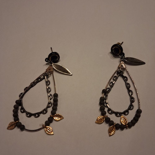 Earrings used black with gold accents