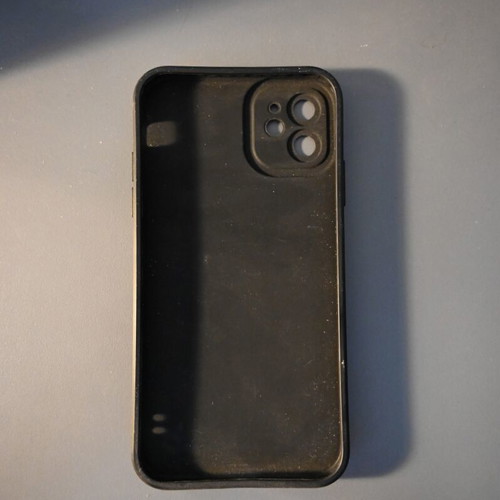 iPhone 11 case used with Nissan Skyline GT-R R34 graphic and Pro Camera protection