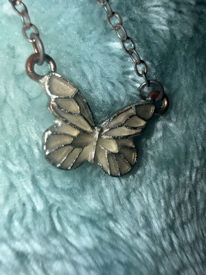 Silver necklace with pearly butterfly used
