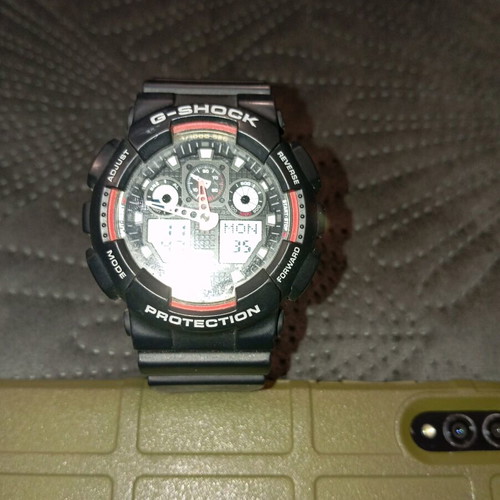 Casio Gshock GA100 watch used, black and red