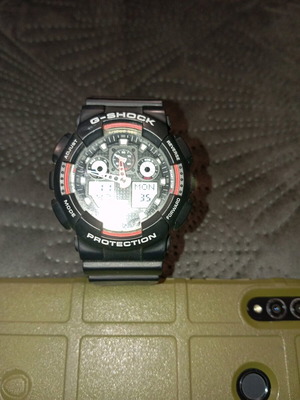 Casio Gshock GA100 watch used, black and red