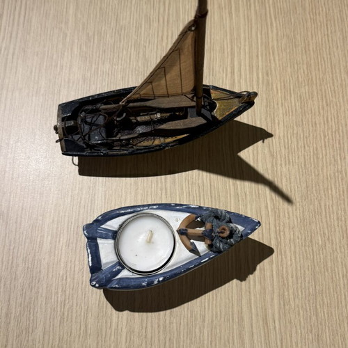 Wooden boat candle holder and decorative boat used