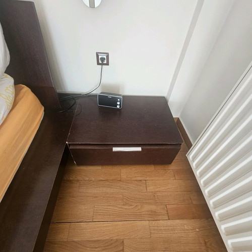 Wooden double bed Casa di Patsi used with storage space