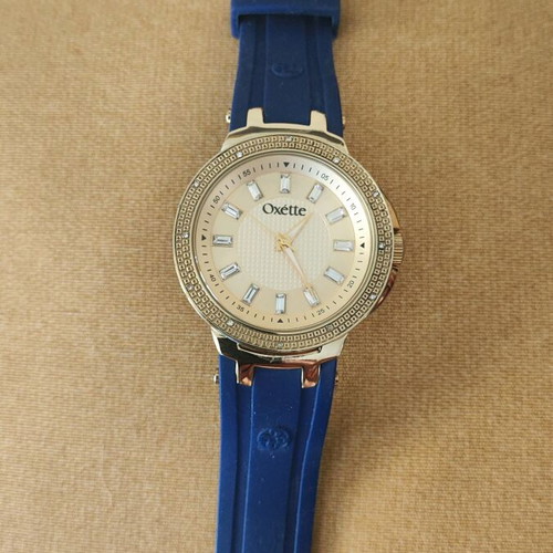 Oxette women's watch like new with blue rubber strap and crystals