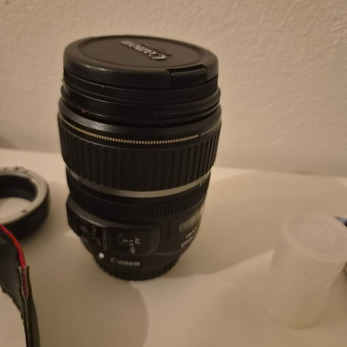 Canon EOS 450D camera used with 17-85mm zoom lens and accessories