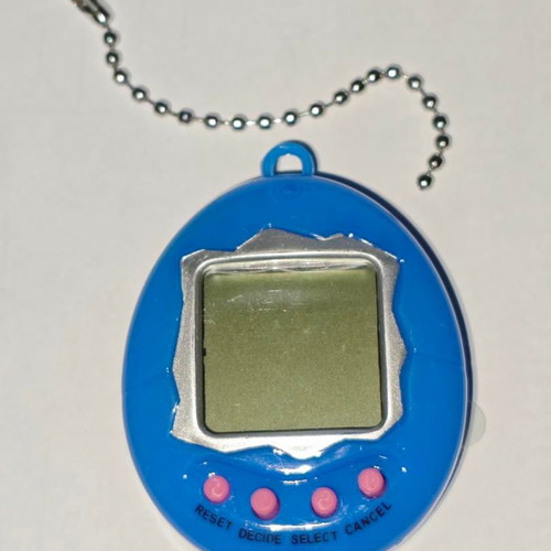 Electronic Digital Retro Virtual Pet Game like new