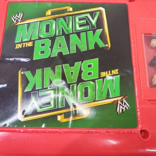 WWE Money in the Bank case with figures and accessories