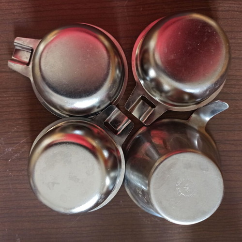 Kitchen set used with molds, cooking cups, wooden fork and sieve