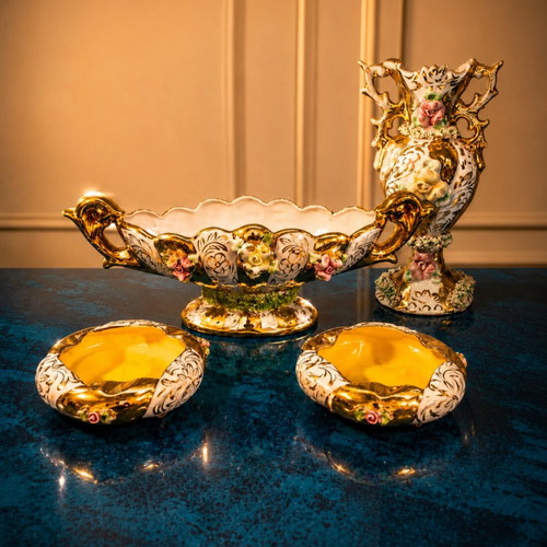 Porcelain set like new with gold details and embossed flowers