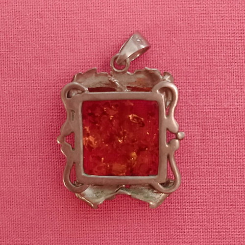 Silver (925) vintage pendant with red/orange amber stone