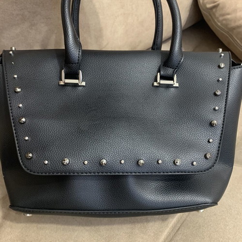 Black handbag with studs used, includes detachable pouch