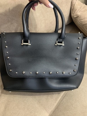 Black handbag with studs used, includes detachable pouch