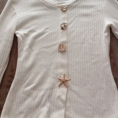 White women's blouse new with gold decorative elements