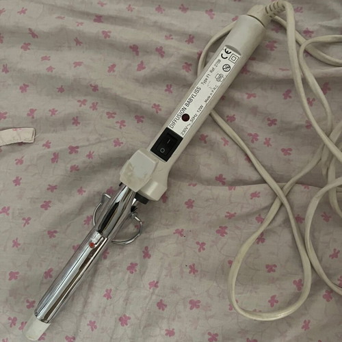 Babyliss curling iron used with ions
