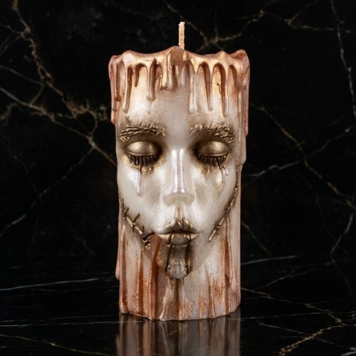 Decorative candle with dark elegance and golden details, new