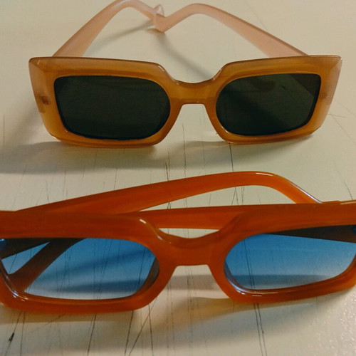 Pervedere two pairs of sunglasses like new, beige and orange