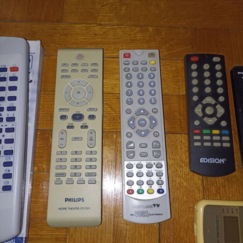 Set of 7 different TV remote controls