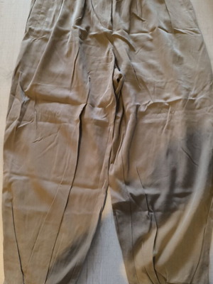 Zara women's beige fabric pants like new, buttoned harem style