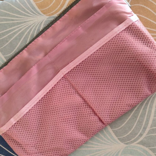 Toiletry bag used with multiple compartments and pockets