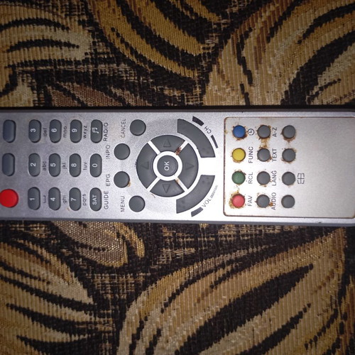 Universal vintage remote control for satellite or digital receiver, used