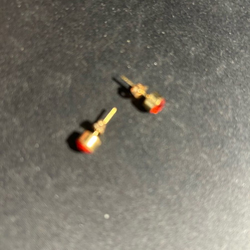 Earrings with red rhinestones used