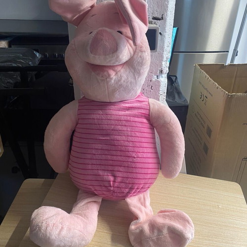 Large stuffed toy used with open seam and missing filling