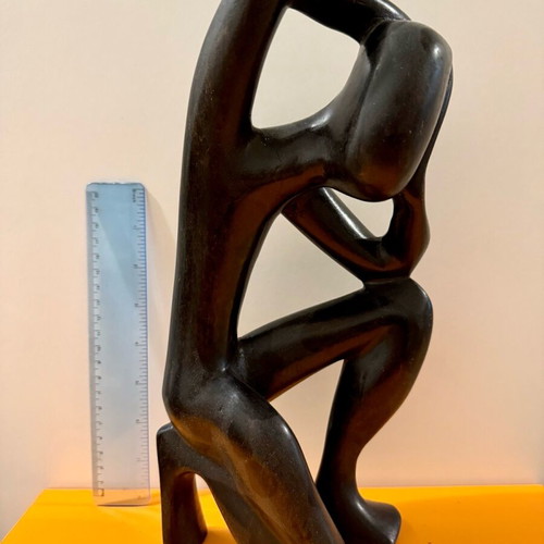 African figure of a thinking man used, solid wood