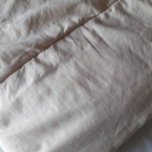 Single bed quilt used, reversible beige and red
