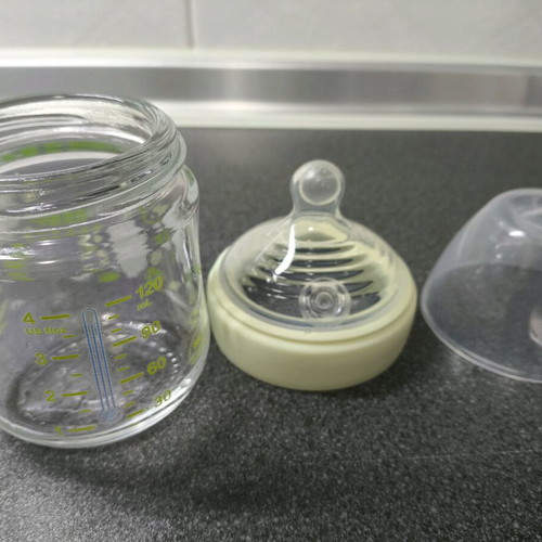 Small glass baby bottle like new with temperature indicator