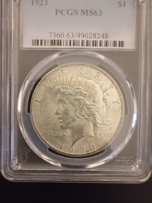 Peace dollar 1923 silver like new, certified PCGS MS 63